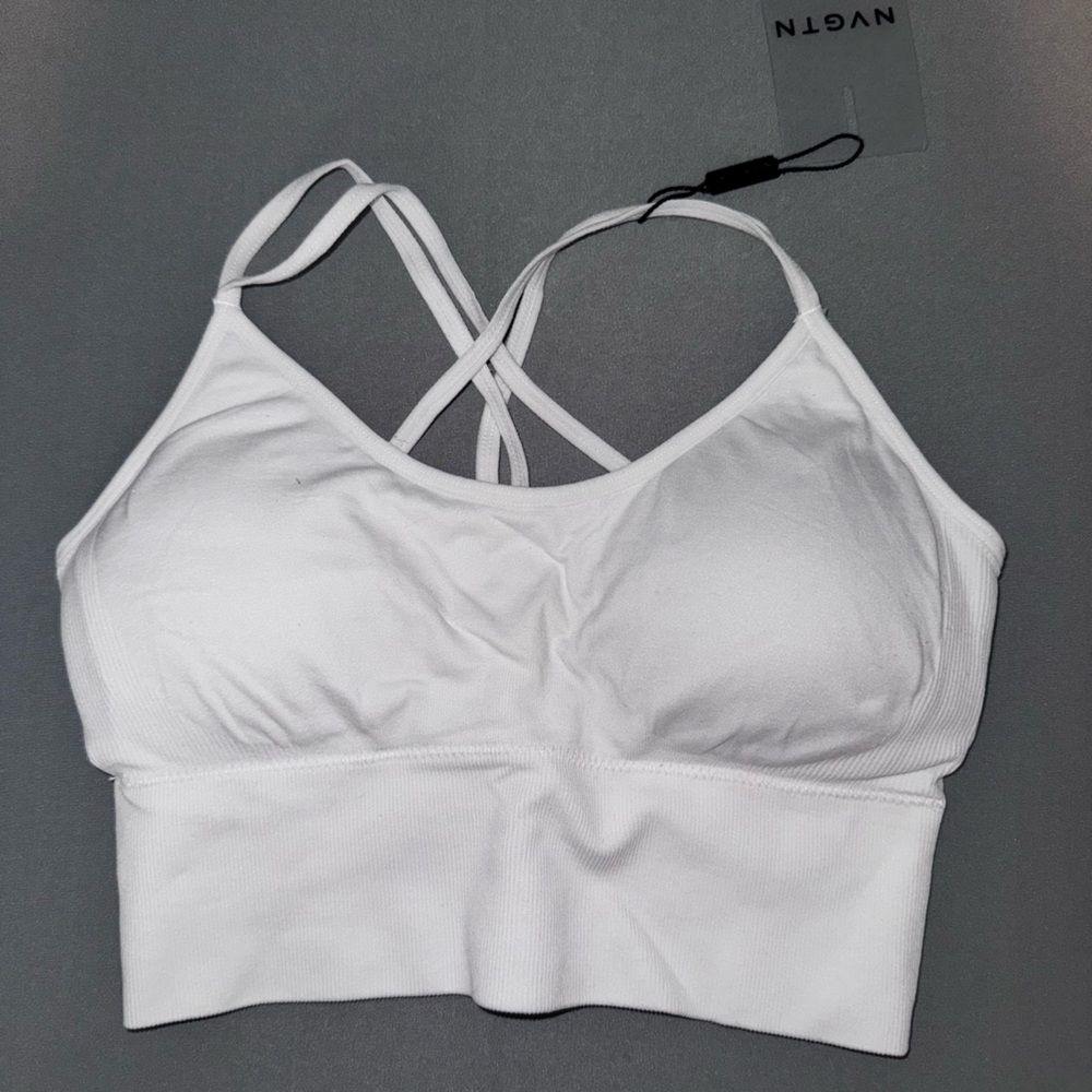 •NEW WITH TAGS 
•NVGTN sports bra 
•White 
•Size Small
